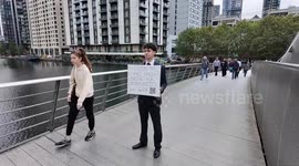 Plucky graduate takes to London streets with CV sign in hopes of finding job