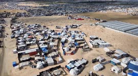 DRONE - Gaza residents forced to bury relatives in agricultural fields amid cemetery shortages due to Israeli genocide