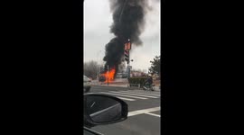 Roadside Vehicle Engulfed in Flames