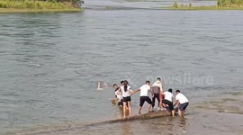 Brave Man Saves Drowning Child and Mother