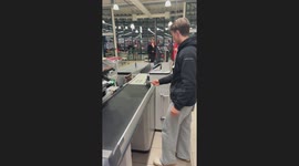 Cat acts as cashier in Valderøy, Norway