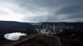 this is a rotating wall cloud near jones mill,Arkansas on 10/18/25 we positioned near the path and deployed the drone and observed this rotating wall cloud with a decent bowl lowering right in the center