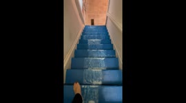 Waterfall illusion staircase stuns TikTok—Michigan home art racks up 10M views