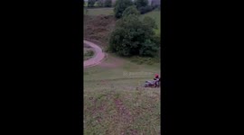Motorcycle fails to climb steep hill in Sichuan, China