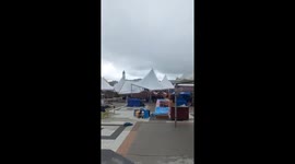Tents blown away by violent storm as it batters event in Indonesia