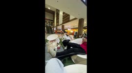 Shopper topples out of rotating teacup chair