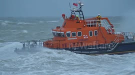 RNLI Lifeboat searching off Newhaven in very stormy seas