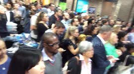 Dozens of people gather to see Prince William arrive at the Shard