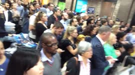 Dozens of people gather to see Prince William arrive at the Shard