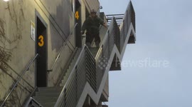 Skiing down a big metal staircase in downtown Beaverton, California
