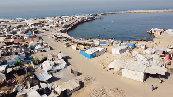DRONE - Gaza Port shelters thousands of displaced Palestinians amid ...