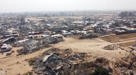 DRONE - Vast piles of rubble swamp Gaza neighborhood following Israeli strikes