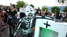 Philippines: More than 1,000 people in Halloween costumes dance, parade and run in celebration of all saints and all souls day