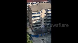 Terrified residents scream in night as building suddenly sinks in China