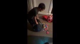 Trick-or-treat jackpot—boy fills bin bag with sweets in viral Halloween haul