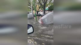 Streets flooded as heavy rain causes chaos in Seville, Spain