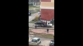 Man runs after tow truck as his car gets taken away in Moscow, Russia