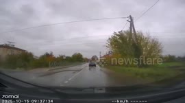 Truck runs red light and crashes into car at intersection in Oryol, Russia