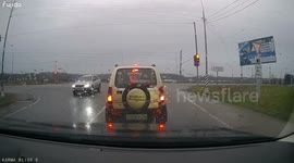 Truck and car collide during rainy morning traffic in Podolsk, Russia