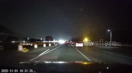 Vehicle briefly catches fire on busy expressway in Shandong, China