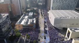 DRONE - Dodgers fans flood downtown LA for World Series parade
