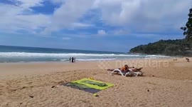 Russian tourist, 31, missing after being swept away by waves on Thai island Phuket