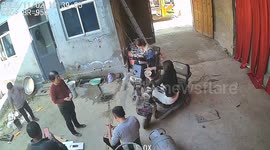 Woman tumbles backwards while trying to rest on mobility scooter