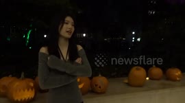 Visitors enjoy photos with carved pumpkins at Kensington's Halloween at the Design Museum