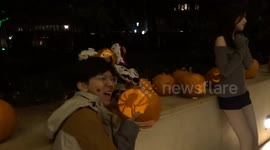 Halloween crowds outside the Design Museum in Kensington on the night of witchcraft