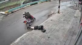 Passenger thrown from moving motorcycle after sudden loss of control