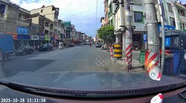 Boy topples off scooter when hit on the leg by passing rider