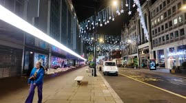Down Oxford Street on the 3rd November on a cold night homeless people sleep next to John Lewis