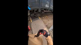 Woman narrowly avoids being hit by train in Bolshyevo Station, Korolyov, Moscow Oblast, Russia