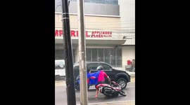 Motorbike toppled by strong winds in Bacolod, Negros Occidental, Philippines