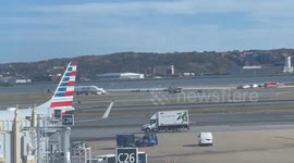 Bomb-threat hoax forces evacuation of United Airlines Flight 512 at Ronald Reagan Washington National Airport; no explosives found, full operations resume