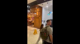 Sydney Airport terminal ceiling leaks after heavy rainstorm