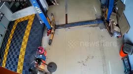 Car drags mat and knocks over carwash attendant