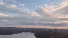 Beautiful sunrise view over lake and cityscape in Cambridge, Massachusetts, USA