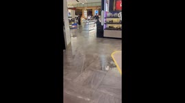 Storm causes flooding and power surges at Sydney airport in Sydney, Australia