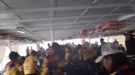 Passengers cling to ferry ceiling as storm pounds vessel in the Philippines