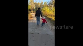 Dad's quick reflexes save toddler after young boy attempts to jump into river