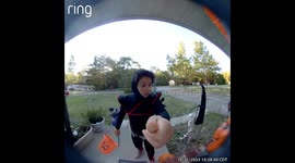 trick or treater runs from decoration after it tells him to run away.