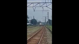 Train hits car and motorcycles on level crossing killing three people