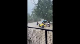 Typhoon Kalmaegi submerges villages as locals flee with their pet dogs