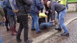 Police drag away Extinction Rebellion protesters in Italy