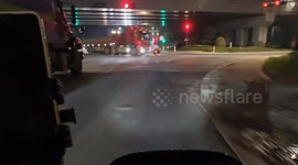 Truck narrowly avoids scooter running red light in China