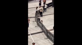 Cheeky girl goes to high five Hyrox athletes but moves hand at last second