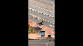 Delivery man’s box catches fire on the road in Tianjin, China