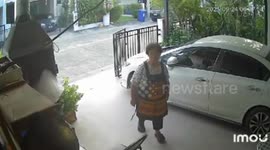 Grandmother falls over as motorcycle accelerator gets stuck