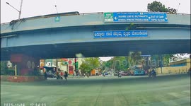 Scooter Rider Narrowly Escapes After Jumping Red Light and Crashing in Bengaluru